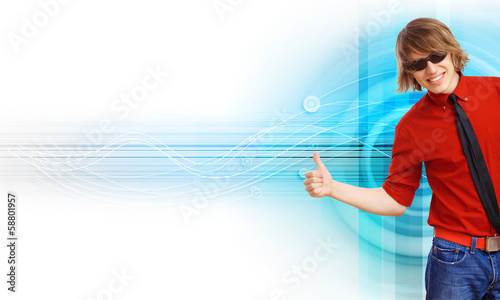 Photo: Happy smiling young man dancing Happy smiling young man dancing