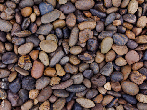 Photo: wet river stones background wet river stones background