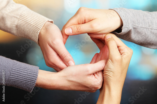 Photo: Human hands on bright background Human hands on bright background