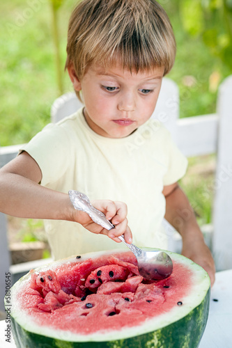 Photo: Young blond boy has healthy eating habits Young blond boy has healthy eating habits