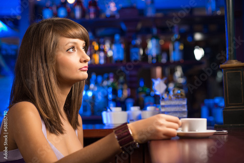 Photo: woman with a cup of coffee woman with a cup of coffee