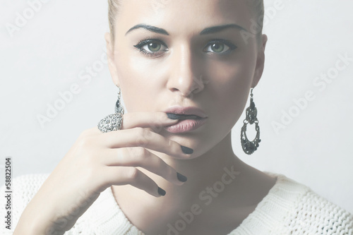 Photo: Beautiful woman.Jewelry and Beauty.manicure.tender Beautiful woman.Jewelry and Beauty.manicure.tender