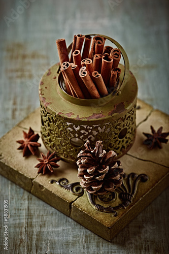 Photo: Cinnamon sticks in a rustic container Cinnamon sticks in a rustic container