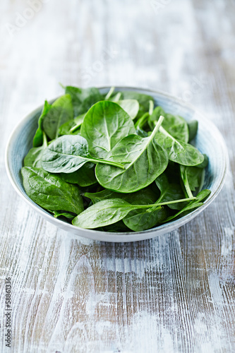 Photo: Fresh baby spinach leaves in a bowl Fresh baby spinach leaves in a bowl
