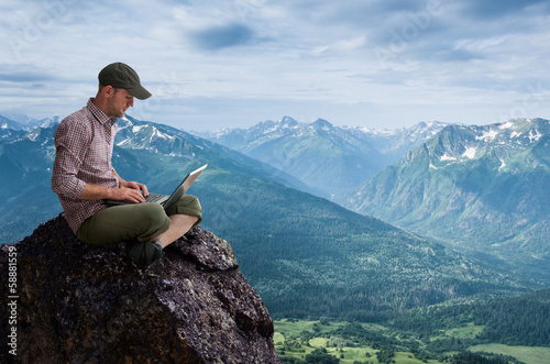 Photo: man working outdoors man working outdoors