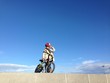 boy with a bicycle looking far ahead boy with a bicycle looking far ahead