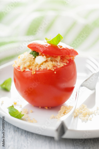 Photo: baked tomato stuffed with couscous and feta baked tomato stuffed with couscous and feta