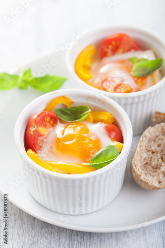 Photo: baked eggs with tomatoes and paprika baked eggs with tomatoes and paprika