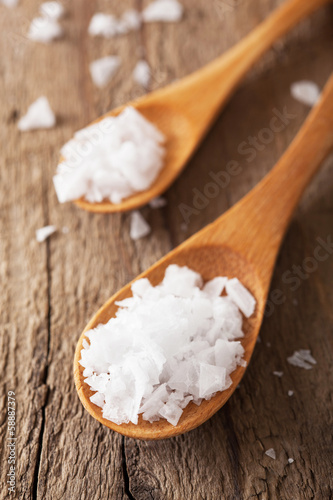 Photo: sea salt in wooden scoop sea salt in wooden scoop