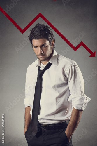 Photo: Businessman worried by financial problems Businessman worried by financial problems
