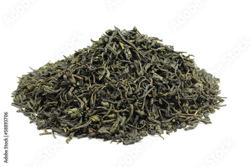 Photo: a handful of green tea on a white background a handful of green tea on a white background