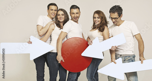 Photo: Attractive group of friends with signs Attractive group of friends with signs