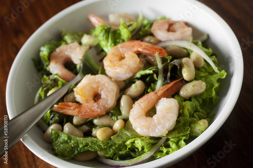 Photo: simple shrimp salad on greens with green dressing simple shrimp salad on greens with green dressing