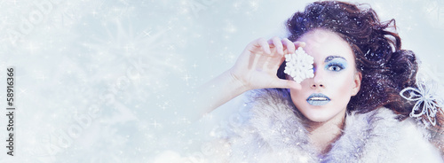 Photo: Winter snow queen - woman with snowflake Winter snow queen - woman with snowflake