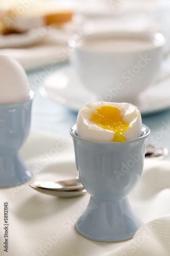 Photo: Breakfast table with soft-boiled egg. Breakfast table with soft-boiled egg.