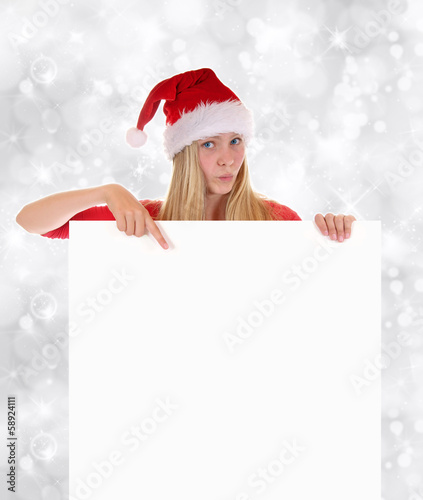 Photo: Weiblicher Nikolaus deutet auf Tafel Weiblicher Nikolaus deutet auf Tafel