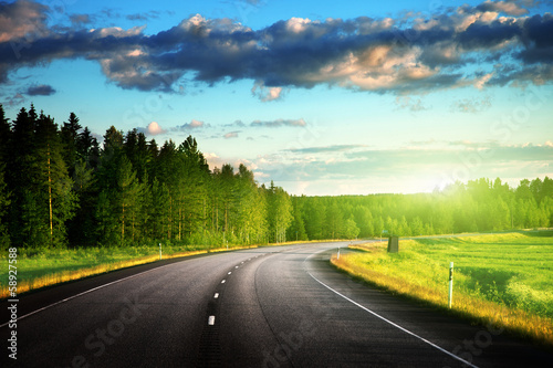Photo: Asphalt road in forest Asphalt road in forest