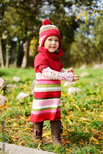 Photo: funny toddler wearing warm clothing funny toddler wearing warm clothing