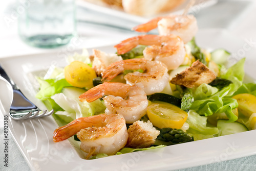 Photo: Closeup of a salad with shrimp and vegetables. Closeup of a salad with shrimp and vegetables.