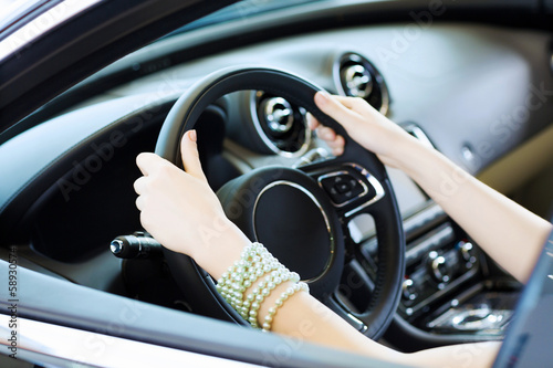 Photo: Woman in car Woman in car