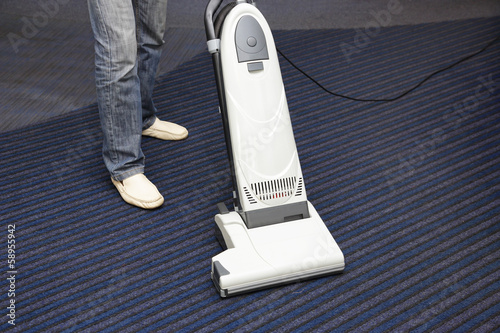 Photo: cleaning the carpet vacuum cleaner cleaning the carpet vacuum cleaner