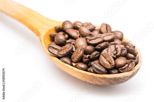 Photo: Wooden Spoon With Coffee Beans On White Background Wooden Spoon With Coffee Beans On White Background