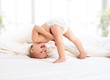 happy baby child playing in bed happy baby child playing in bed