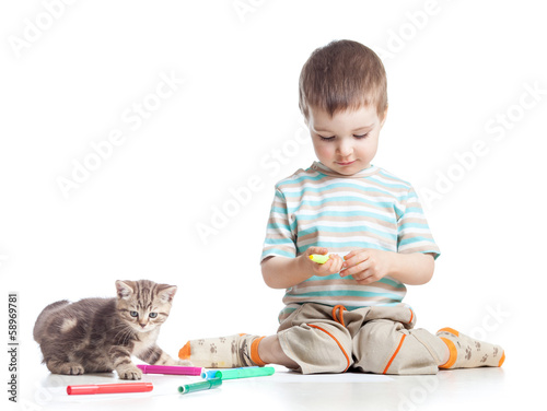 Photo: kid drawing felt pens with cat kid drawing felt pens with cat