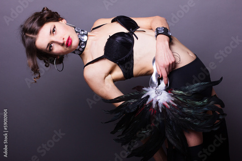 Photo: Sexy young woman in lingerie with mask Sexy young woman in lingerie with mask