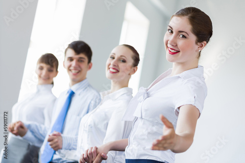 Photo: Businessteam holding hands Businessteam holding hands