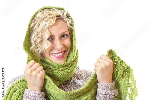 Photo: Female wrapped with wool scarf and cap, isolated on white Female wrapped with wool scarf and cap, isolated on white
