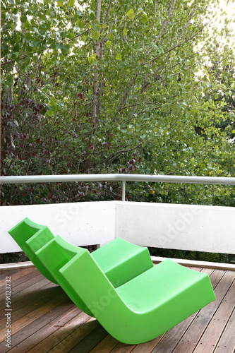 Photo: Green chairs on deck Green chairs on deck