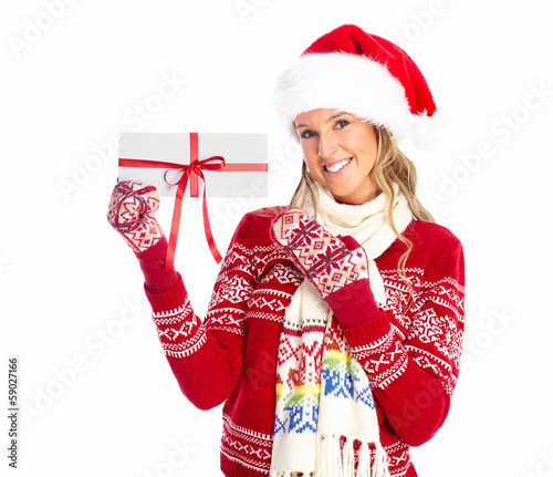 Photo: Happy woman with christmas present. Happy woman with christmas present.