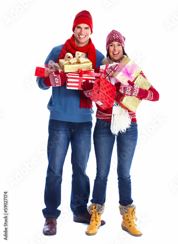 Photo: Happy couple with christmas gifts. Happy couple with christmas gifts.