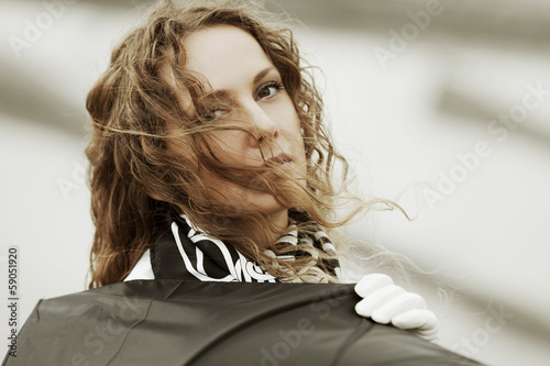 Photo: Sad beautiful woman with umbrella Sad beautiful woman with umbrella