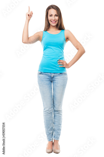 Photo: Attractive woman pointing finger Attractive woman pointing finger