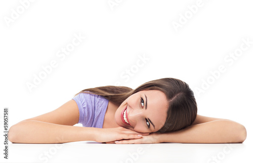Photo: Woman leaning on table Woman leaning on table