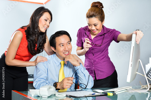 Photo: Asian Womanizer boss flirting at the office Asian Womanizer boss flirting at the office