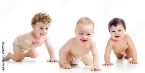 Photo: Babies group wearing diapers. Kids are crawling on floor. Babies group wearing diapers. Kids are crawling on floor.