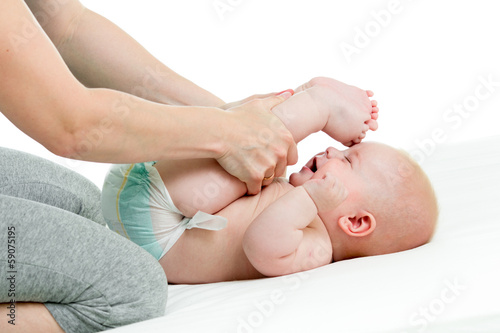 Photo: mother doing gymnastics her kid mother doing gymnastics her kid