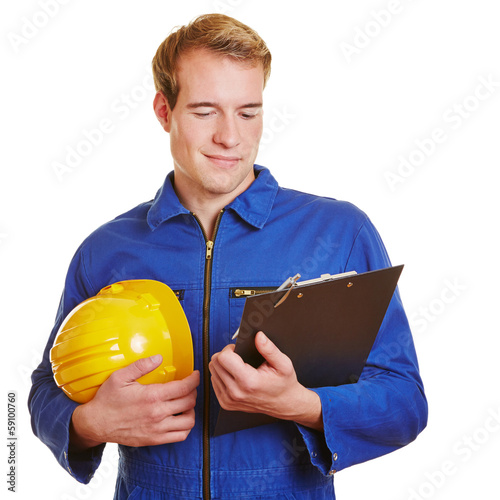 Photo: Construction worker with clipboard Construction worker with clipboard