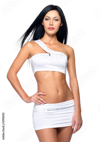 Photo: Beautiful woman with sporty slim body Beautiful woman with sporty slim body