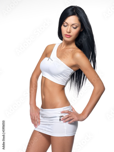 Photo: Beautiful woman with sporty slim body Beautiful woman with sporty slim body