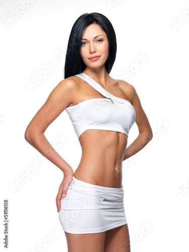 Photo: Beautiful woman with sporty slim body Beautiful woman with sporty slim body