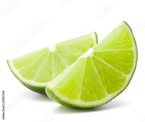 Photo: Citrus lime fruit segment isolated on white background cutout Citrus lime fruit segment isolated on white background cutout