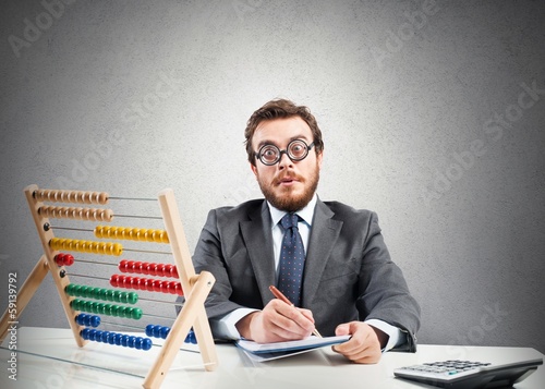 Photo: Nerd financial businessman Nerd financial businessman