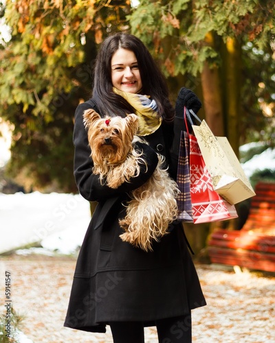 Photo: Stylish dog with owner gone shopping Stylish dog with owner gone shopping