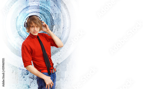 Photo: Happy smiling young man dancing Happy smiling young man dancing
