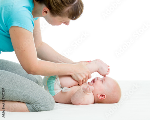Photo: mother doing gymnastics her child mother doing gymnastics her child