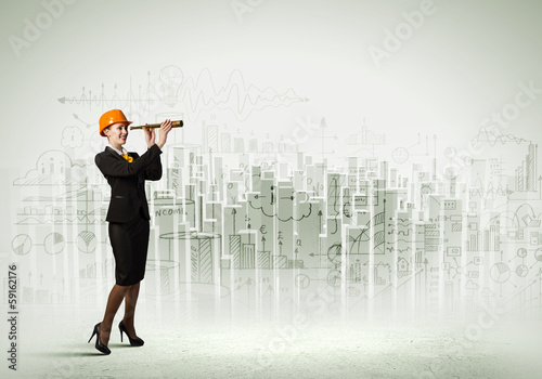 Photo: Woman engineer with scope Woman engineer with scope
